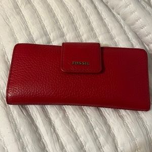 Brand new leather Fossil wallet. Never used. Beautiful color